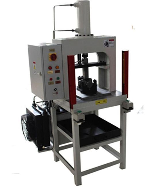 鑄件中孔剪緣機.jpg 鑄件中孔剪緣機.jpg